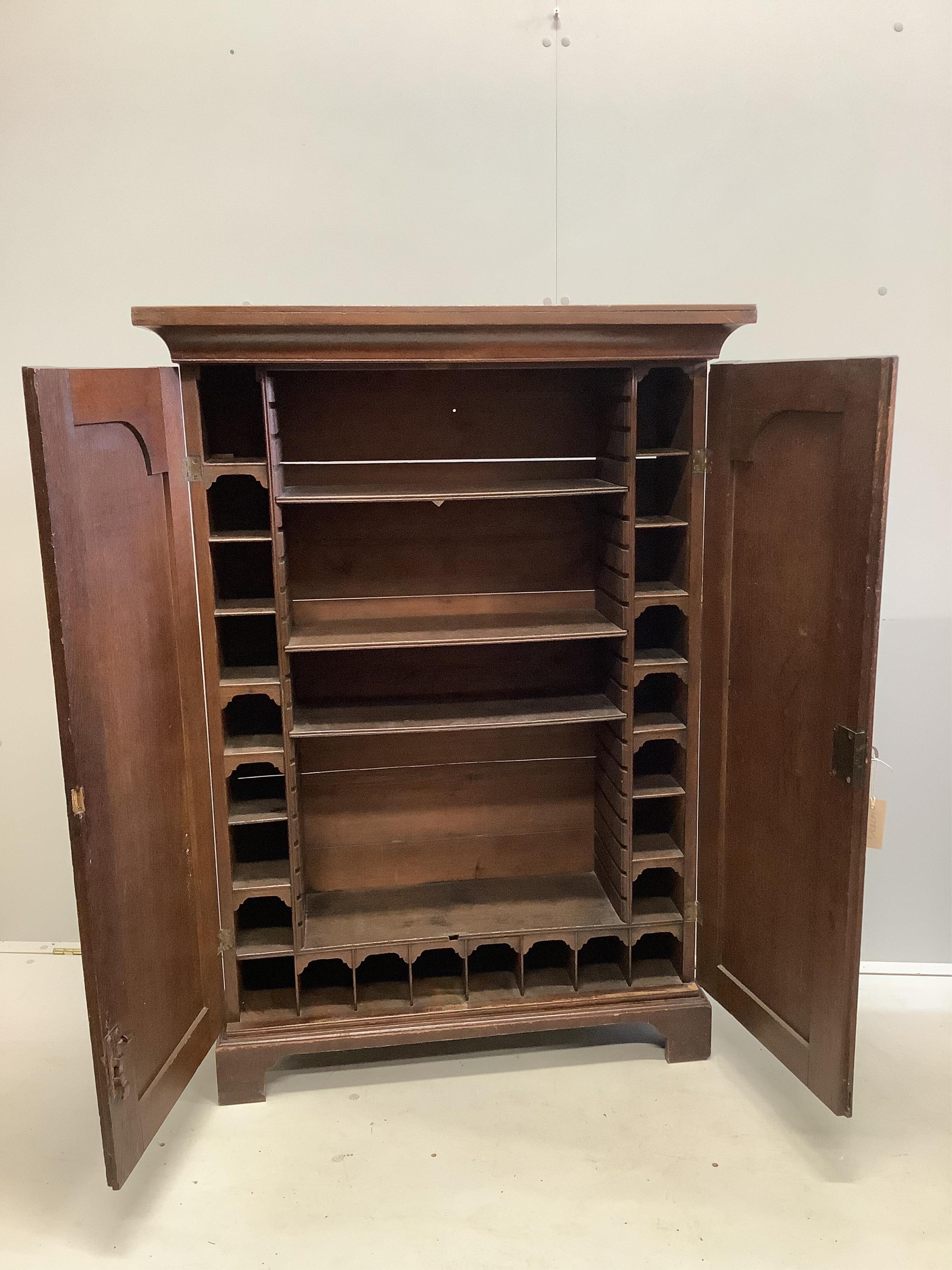 A George III oak two door cabinet, adapted, width 92cm, depth 30cm, height 129cm